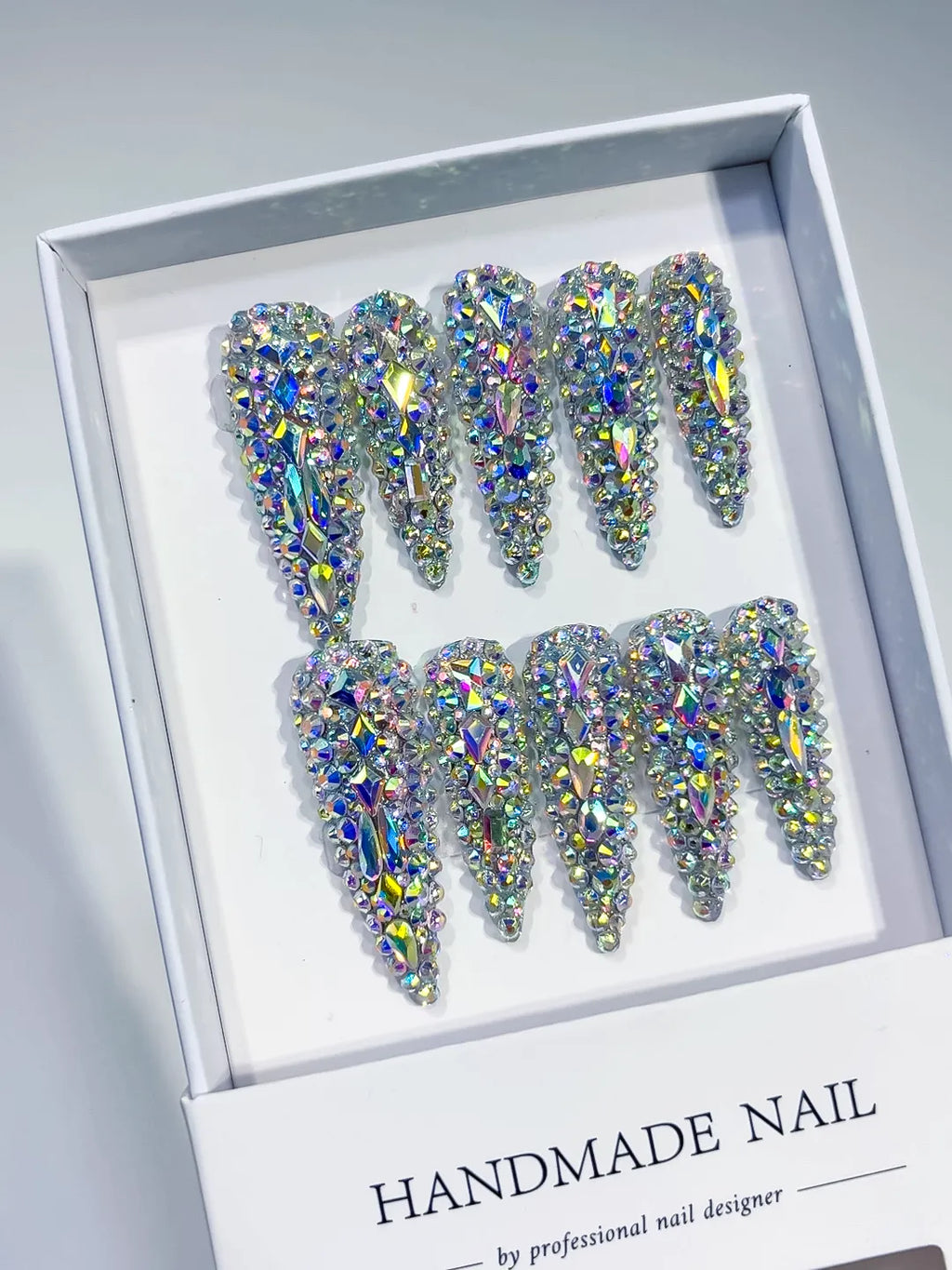 Silver Multicolor Solid color Rhinestone Crystal Cluster press on nails angled view