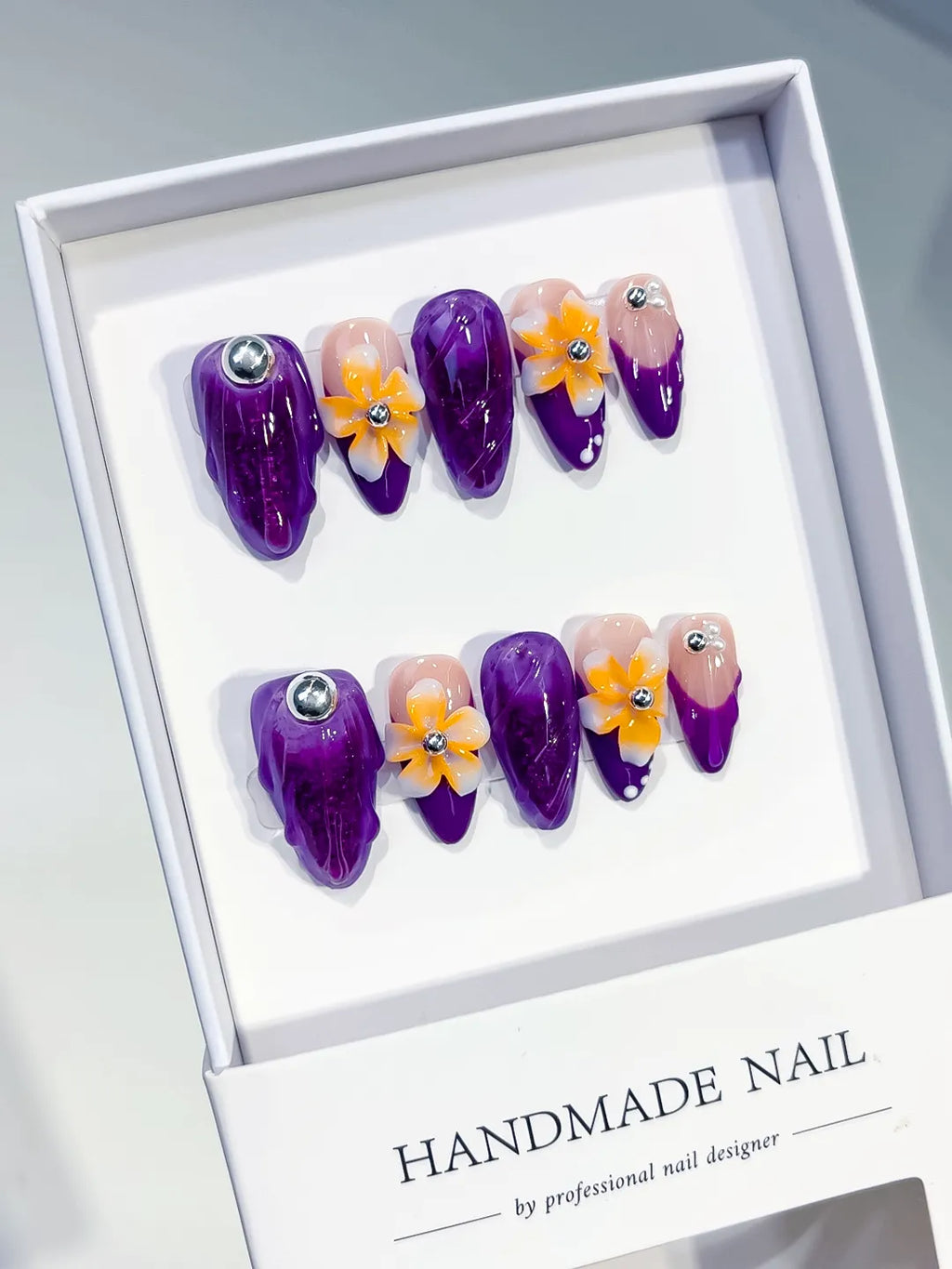 Purple Nude Yellow Orange Silver Abstract Flower Rhinestone Marble press on nails angled view