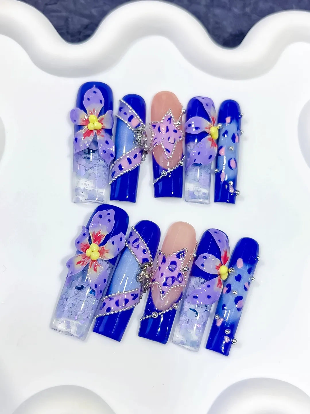 Blue Nude Purple Silver Abstract Flower Glitter Bow Rhinestone 3D press on nails close up