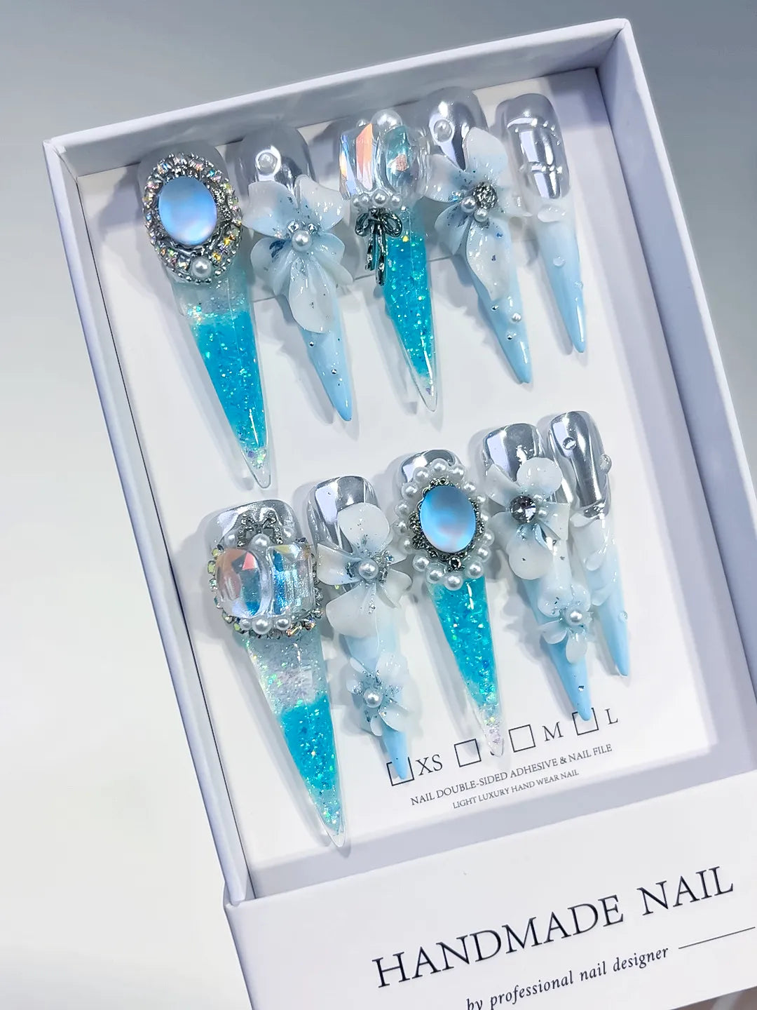 Blue White Silver Multicolor Glitter Flower Pearl Rhinestone Metallic Accent 3D press on nails angled view