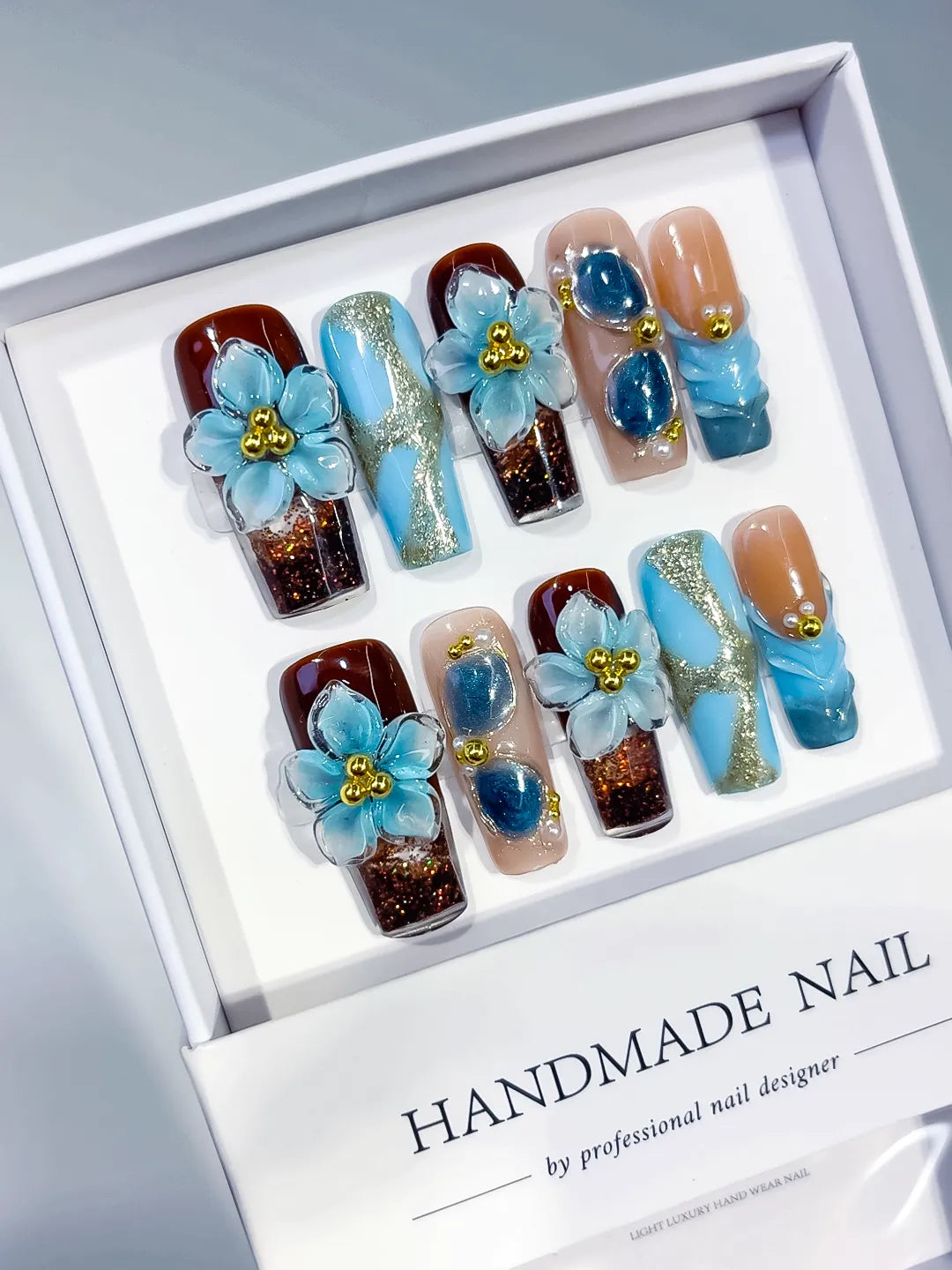 Brown Blue Gold Nude Silver Abstract Flower Glitter Pearl 3D Texture press on nails angled view