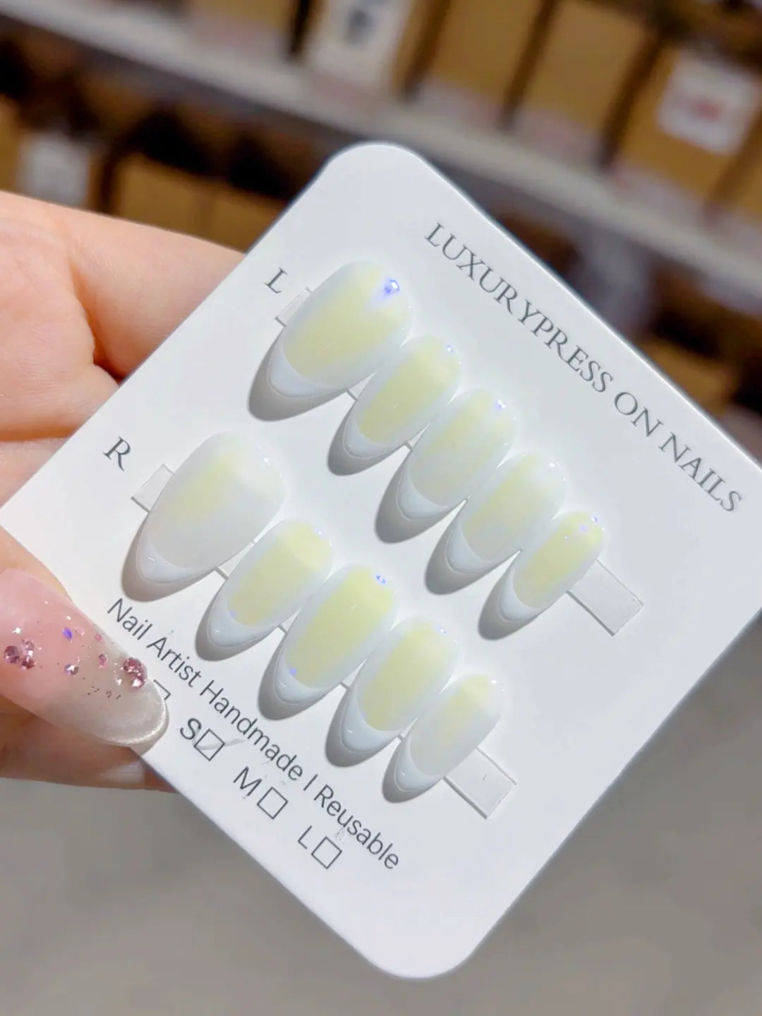 handmade press on nails almond french gradient white angled view