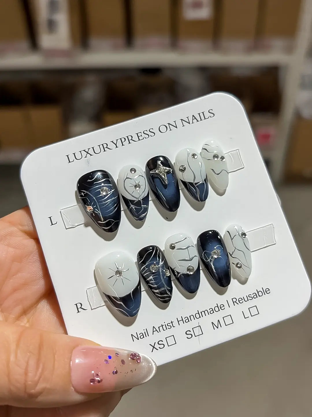 handmade press on nails angled view showing silver accents