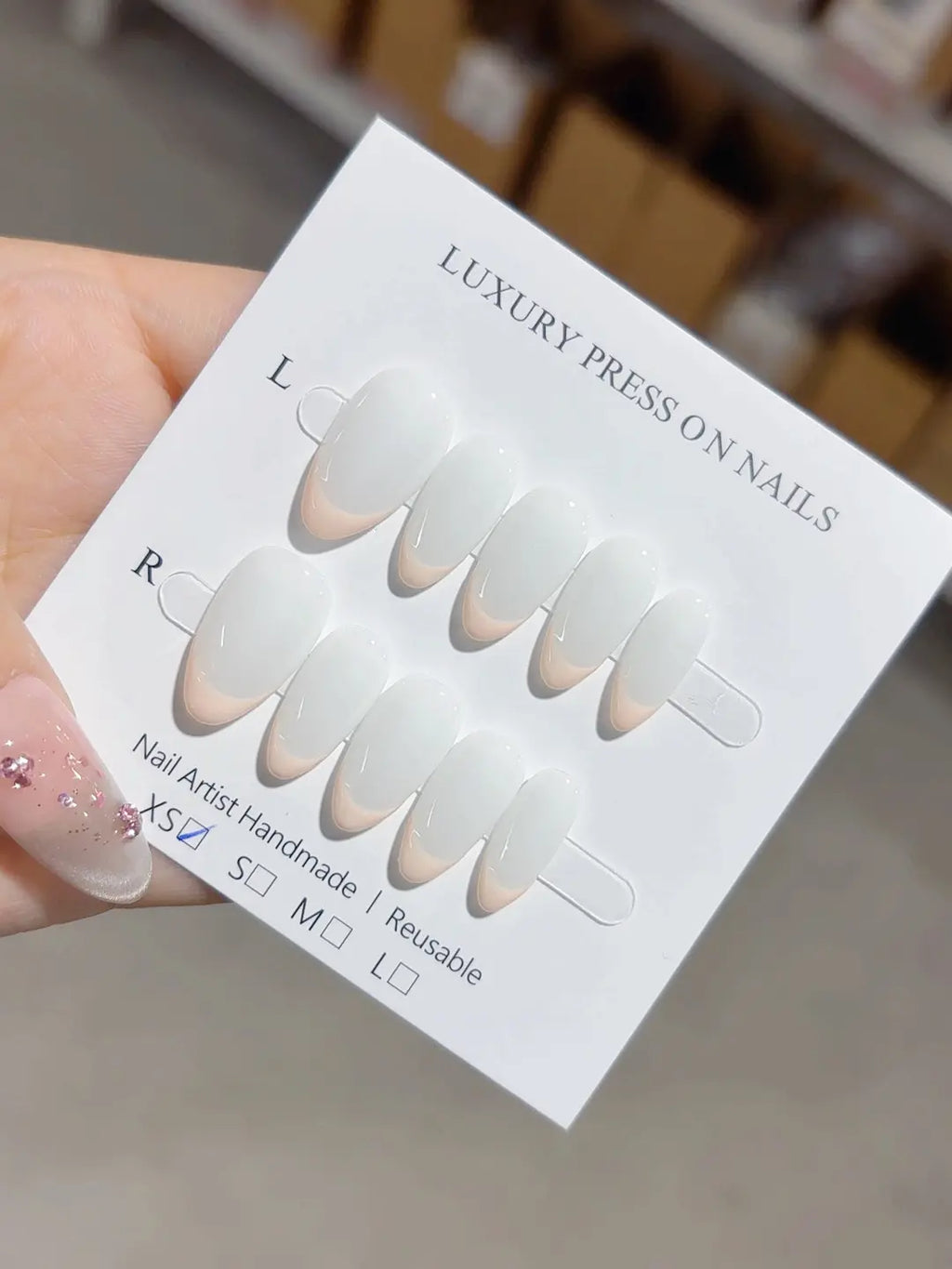 handmade press on nails short almond white tips, close-up detail