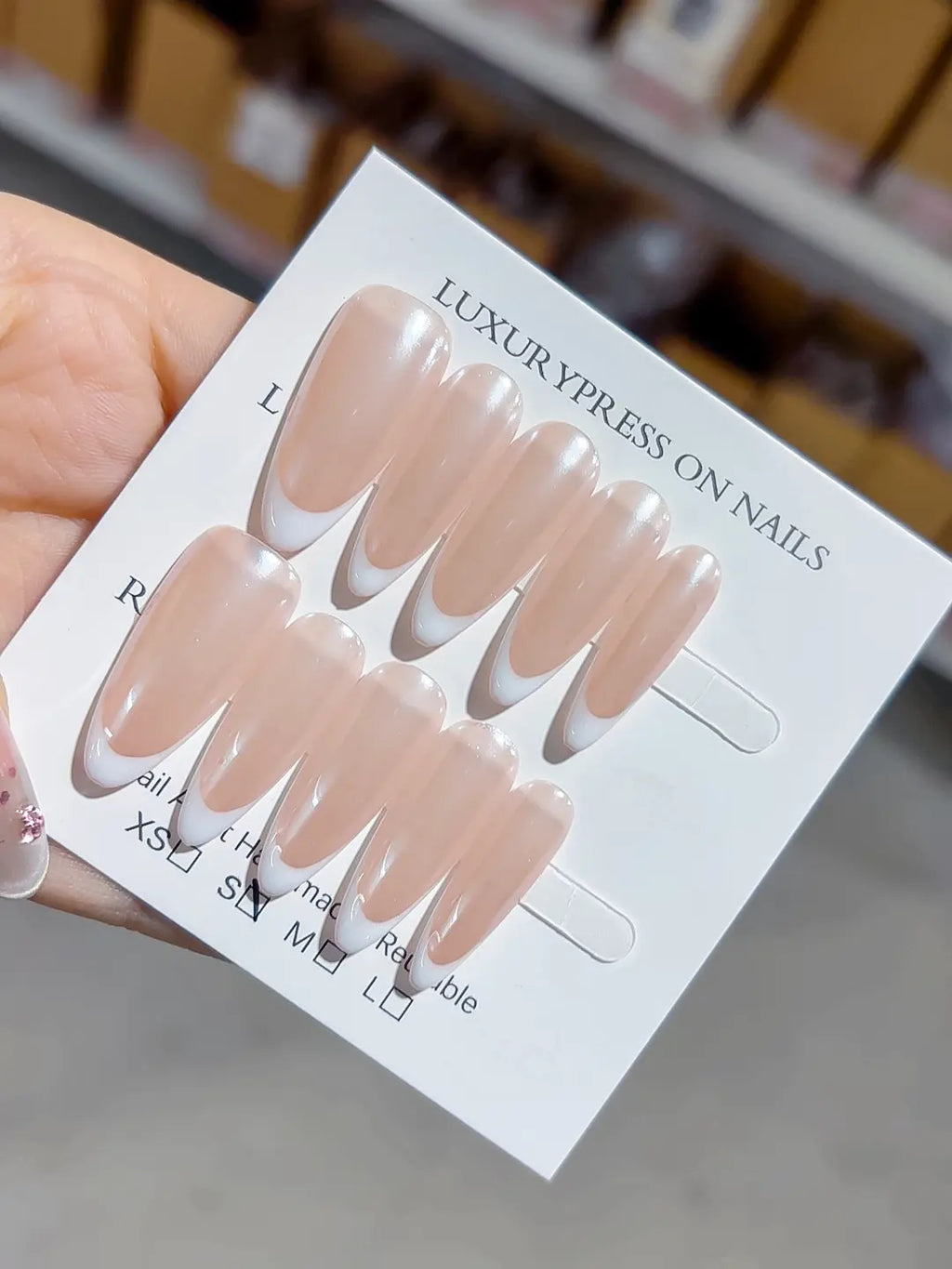 handmade press on nails showcasing glazed shine on nude French design