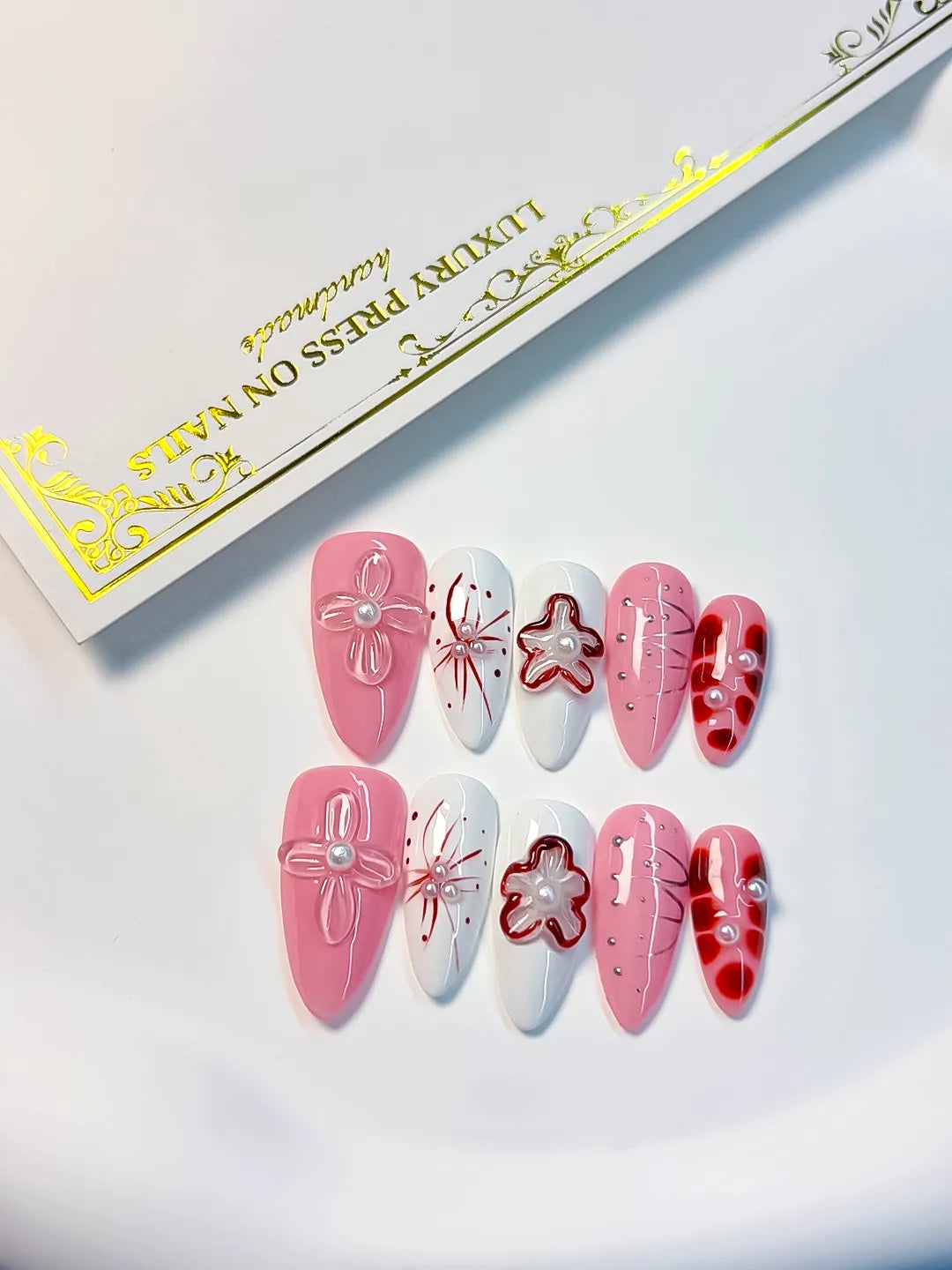 Pink White Red Abstract Bow Flower Pearl press on nails detail view