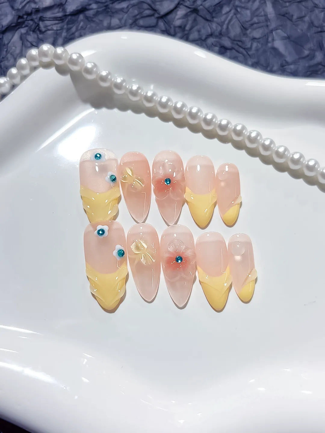 Nude Yellow French tip Flower Rhinestone press on nails detail view