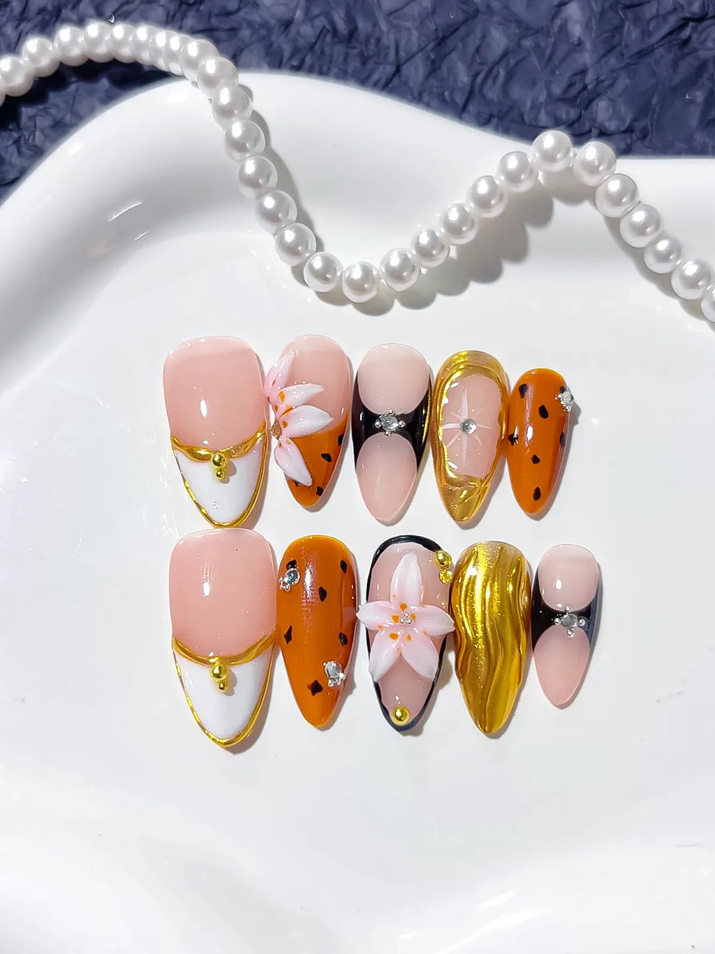 Nude Orange Gold Black Abstract Flower Metallic press on nails full set view