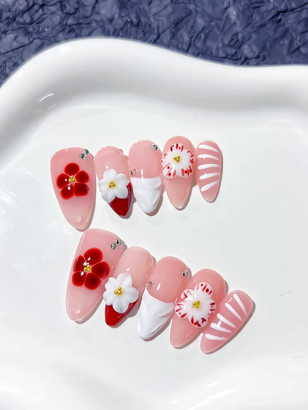 Pink White Red French tip Flower Rhinestone press on nails close up