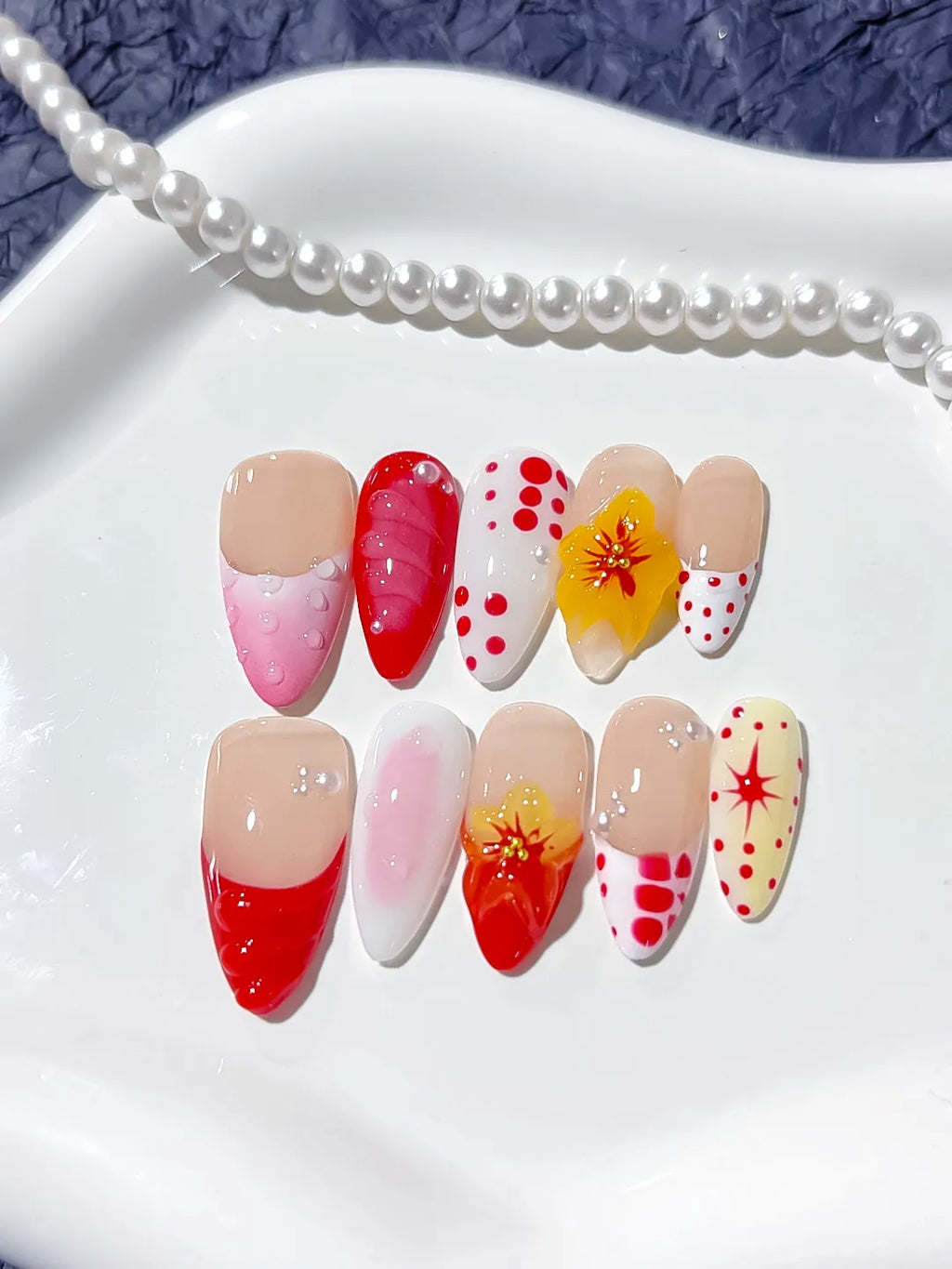 Nude Red Pink White French tip Flower Dot Pattern press on nails detail view
