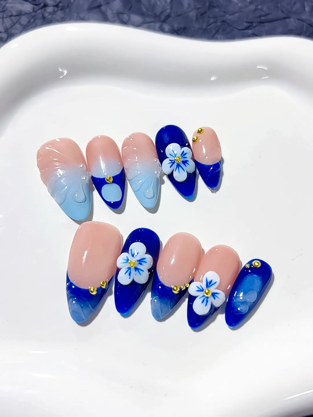 Nude Blue French tip Flower Metallic press on nails detail view