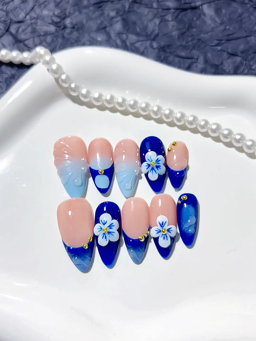 Nude Blue French tip Flower Metallic press on nails detail view