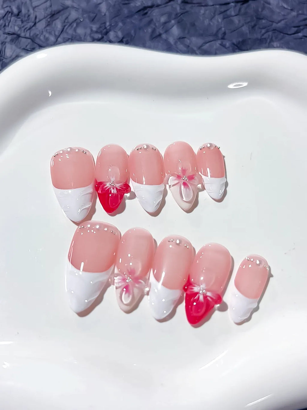 Pink White Red French tip Bow Flower Pearl press on nails angled view