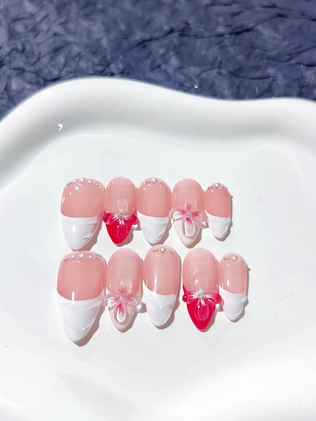 Pink White Red French tip Bow Flower Pearl press on nails close up