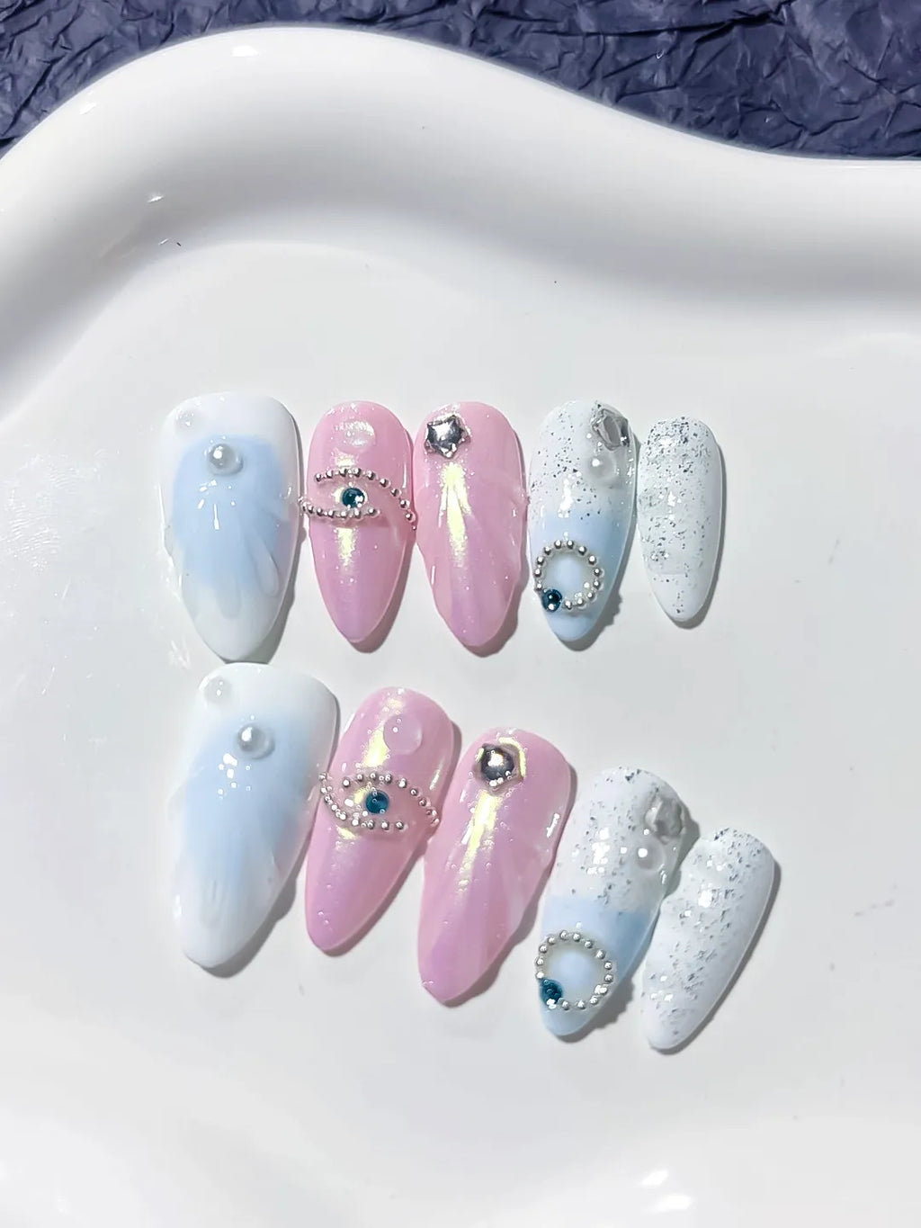 Pink White Blue Holographic Rhinestone Embossed press on nails angled view