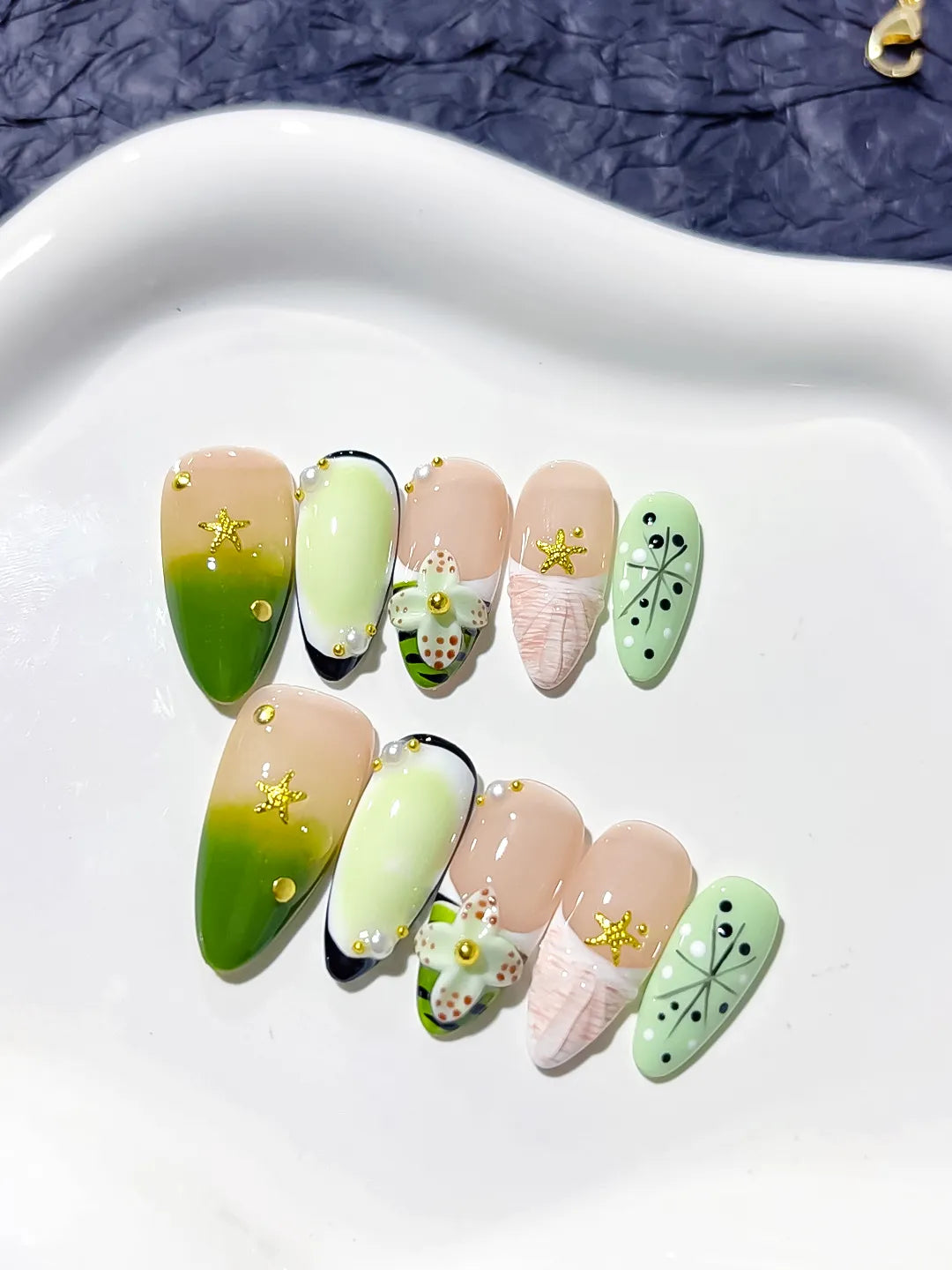Green Nude Black Abstract Flower Star press on nails detail view