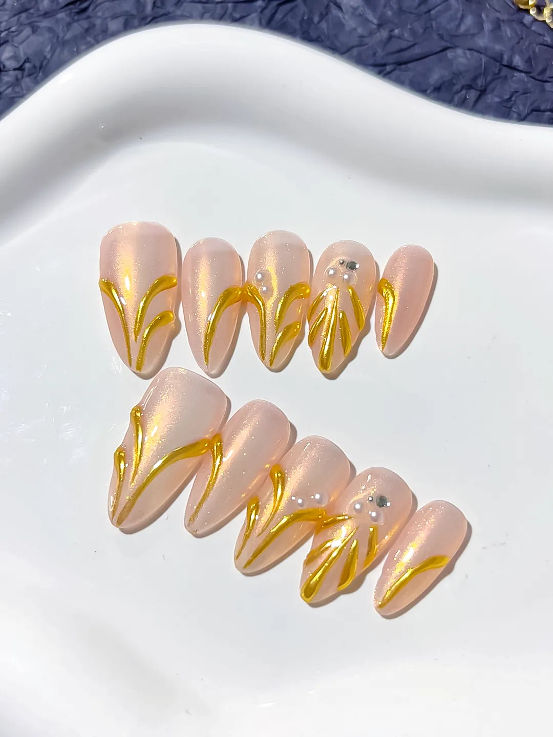 Nude Gold Metallic Rhinestone press on nails close up