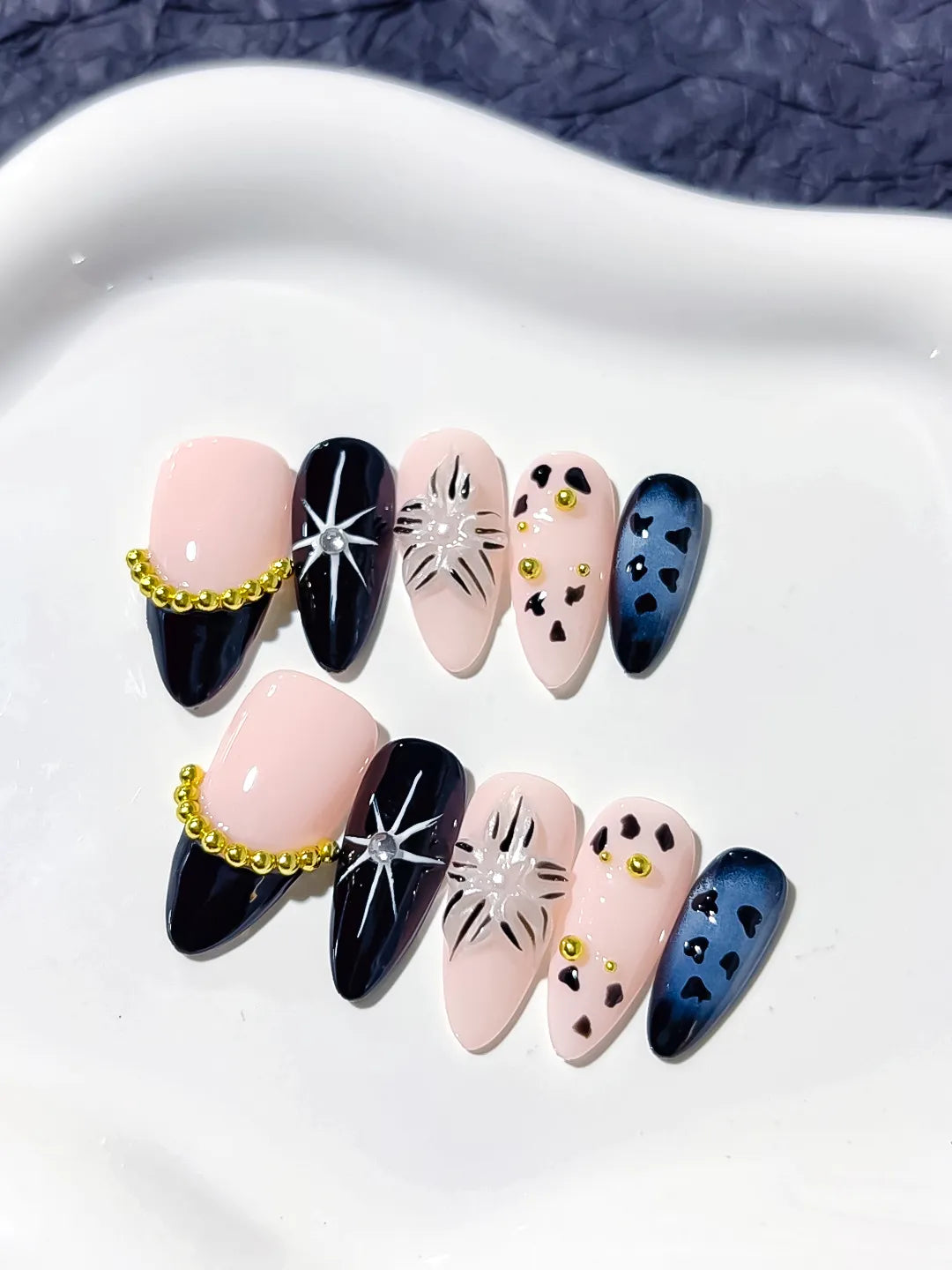 Nude Black Blue Gold French tip Star Animal Print Bead Chain press on nails detail view