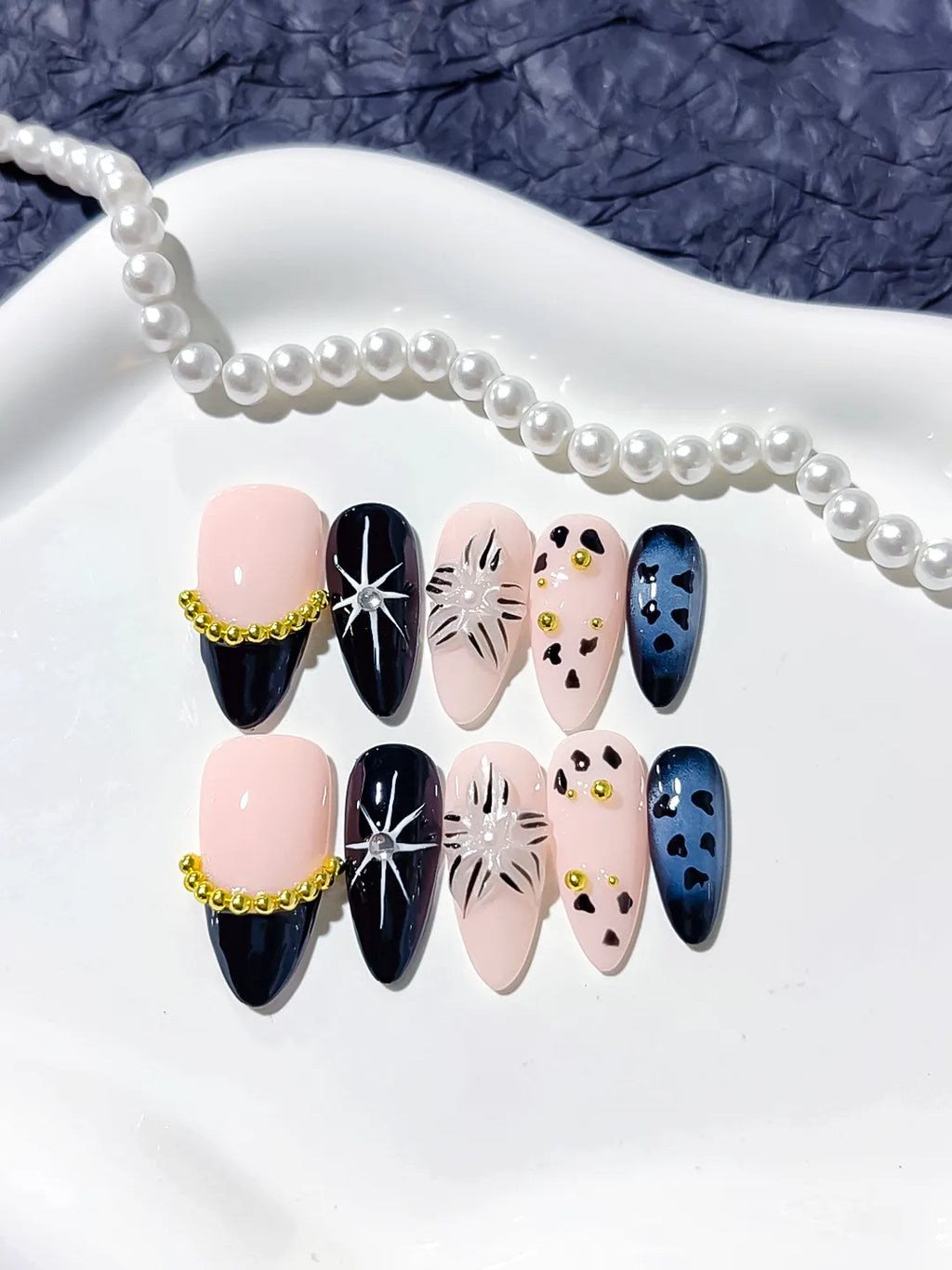 Nude Black Blue Gold French tip Star Animal Print Bead Chain press on nails detail view