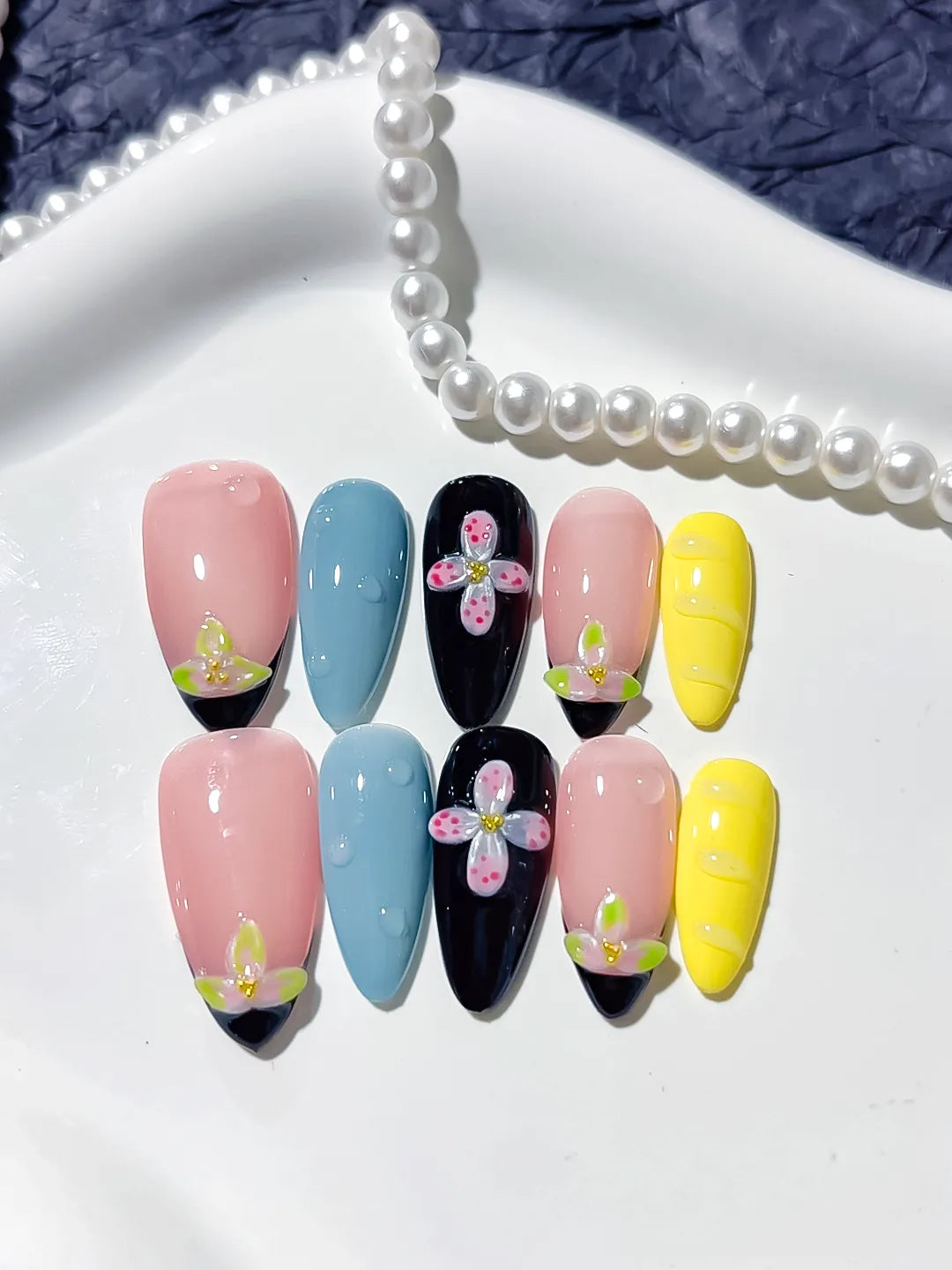Nude Pink Blue Yellow Black Abstract Flower Embossed press on nails detail view