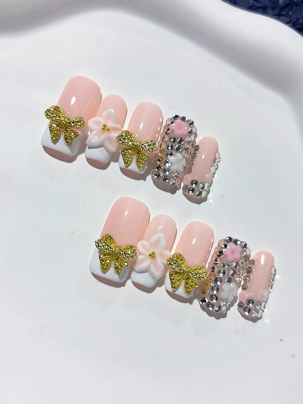 Nude Gold White Glitter Bow Flower Rhinestone press on nails detail view