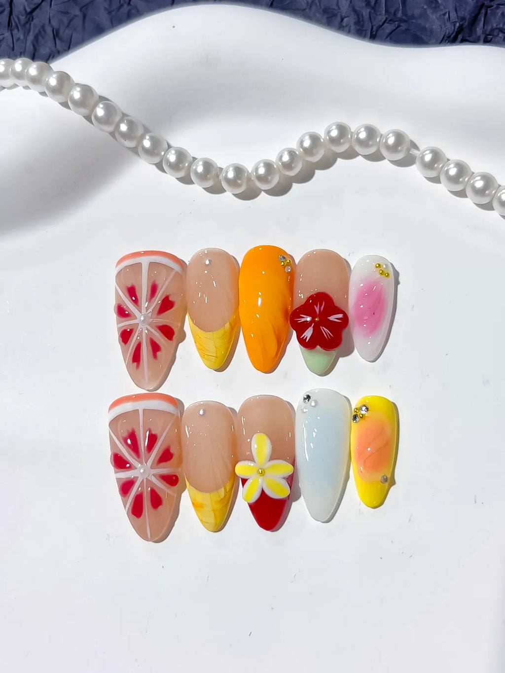 Nude Orange Pink Yellow Blue Abstract Flower Citrus press on nails detail view