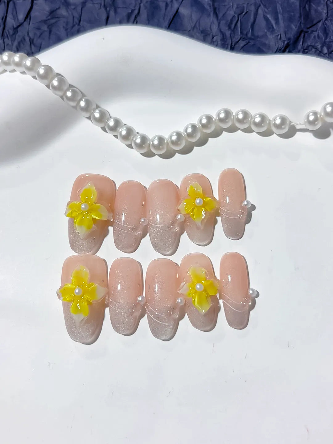Nude Yellow Solid color Flower Pearl Line press on nails detail view