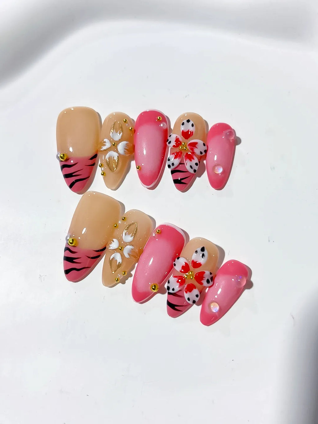 Pink Gold Black Nude Abstract Heart Animal Print Metallic press on nails detail view