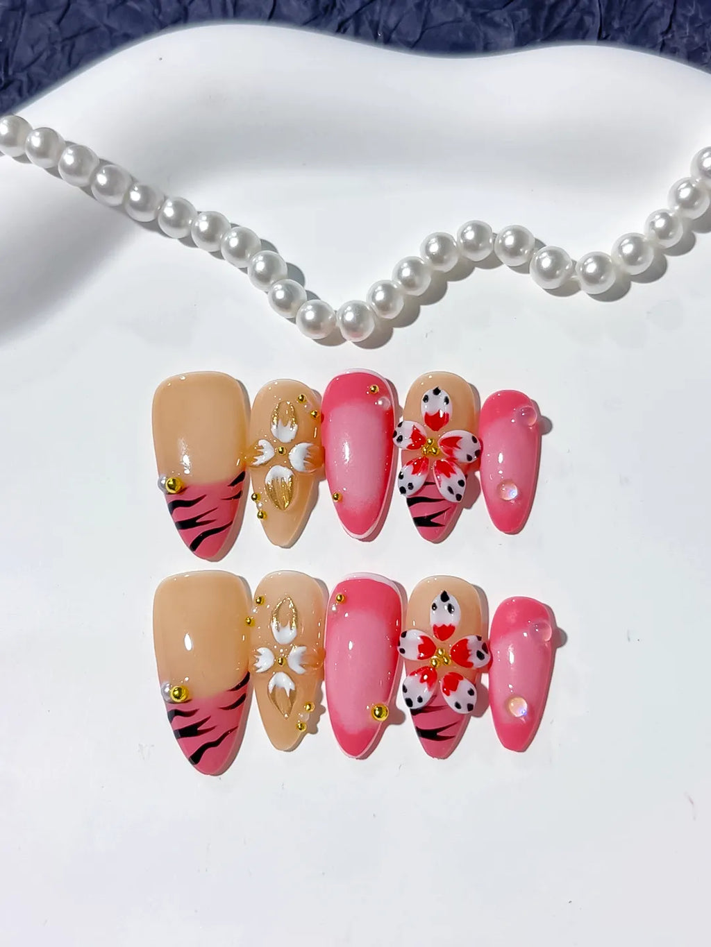 Pink Gold Black Nude Abstract Heart Animal Print Metallic press on nails detail view