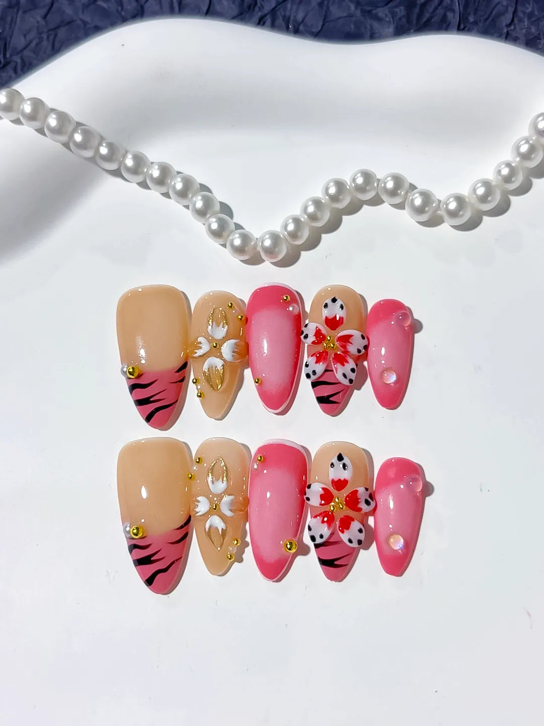 Pink Gold Black Nude Abstract Heart Animal Print Metallic press on nails detail view