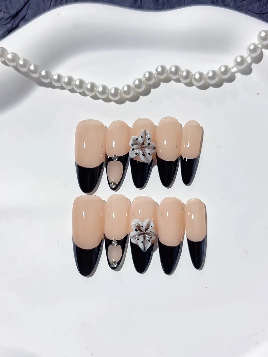 Nude Black White French tip Flower Rhinestone press on nails angled view