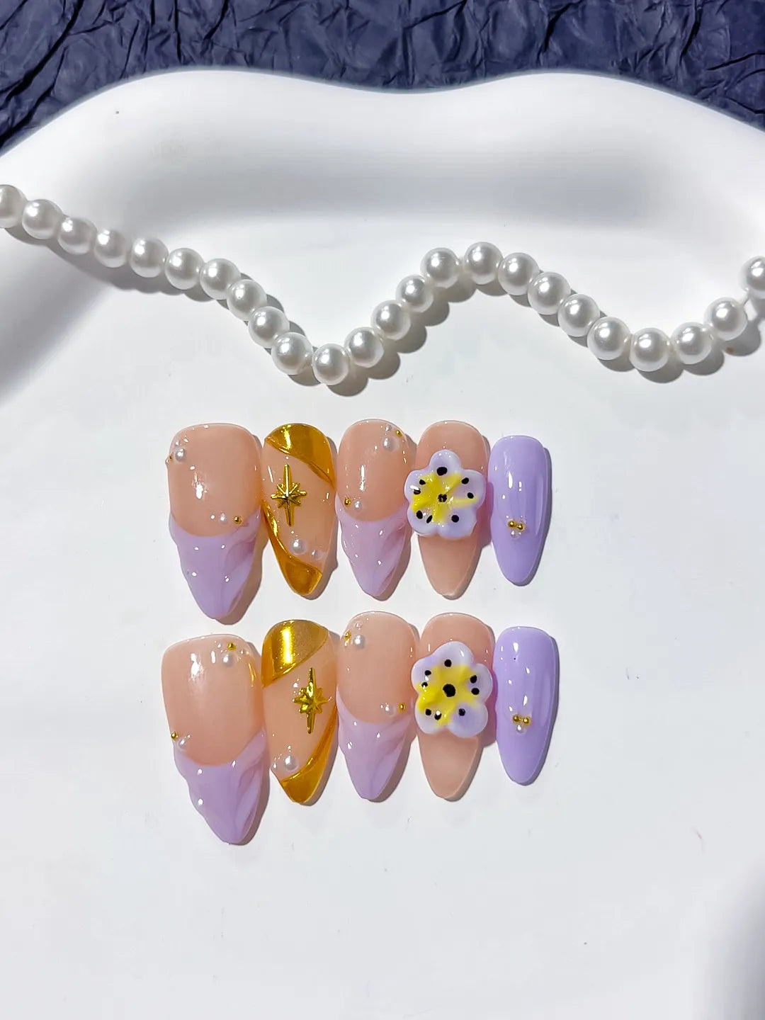 Nude Gold Purple French tip Flower Star press on nails close up