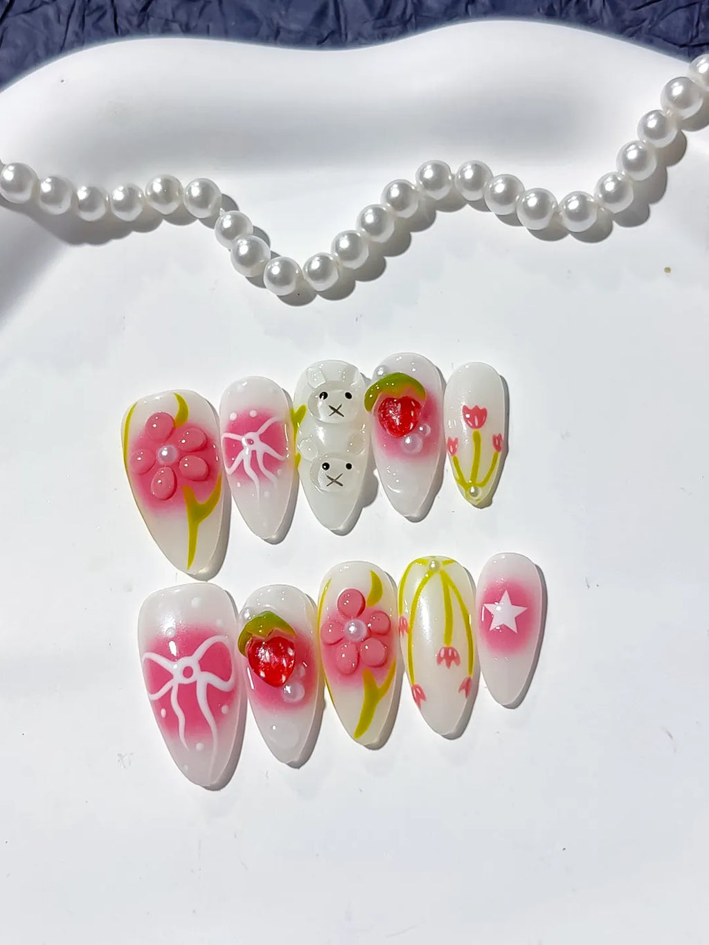 White Pink Abstract Strawberry Bow Tulip Star press on nails detail view