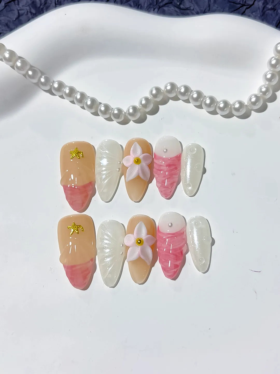Nude Pink White Abstract Flower Star press on nails detail view