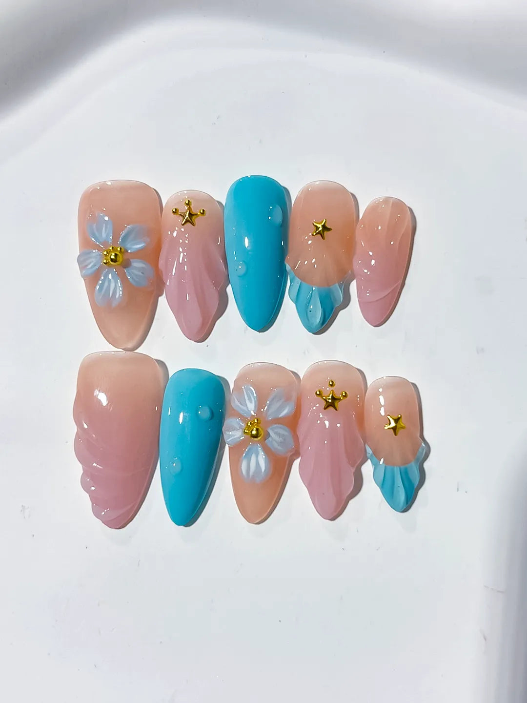 Nude Pink Blue Abstract Flower Star press on nails detail view