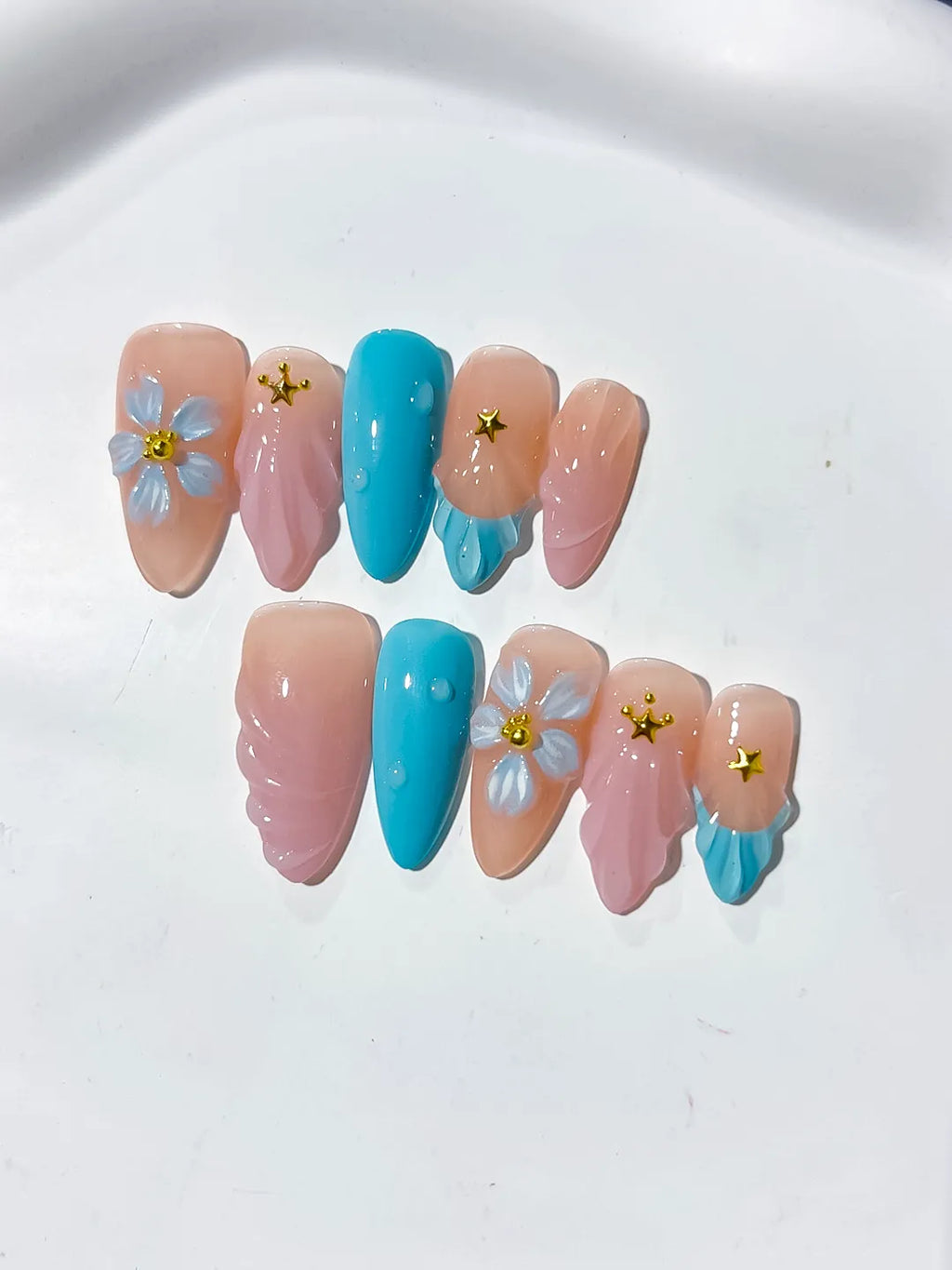 Nude Pink Blue Abstract Flower Star press on nails detail view