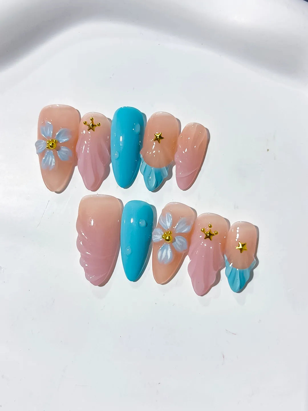 Nude Pink Blue Abstract Flower Star press on nails detail view