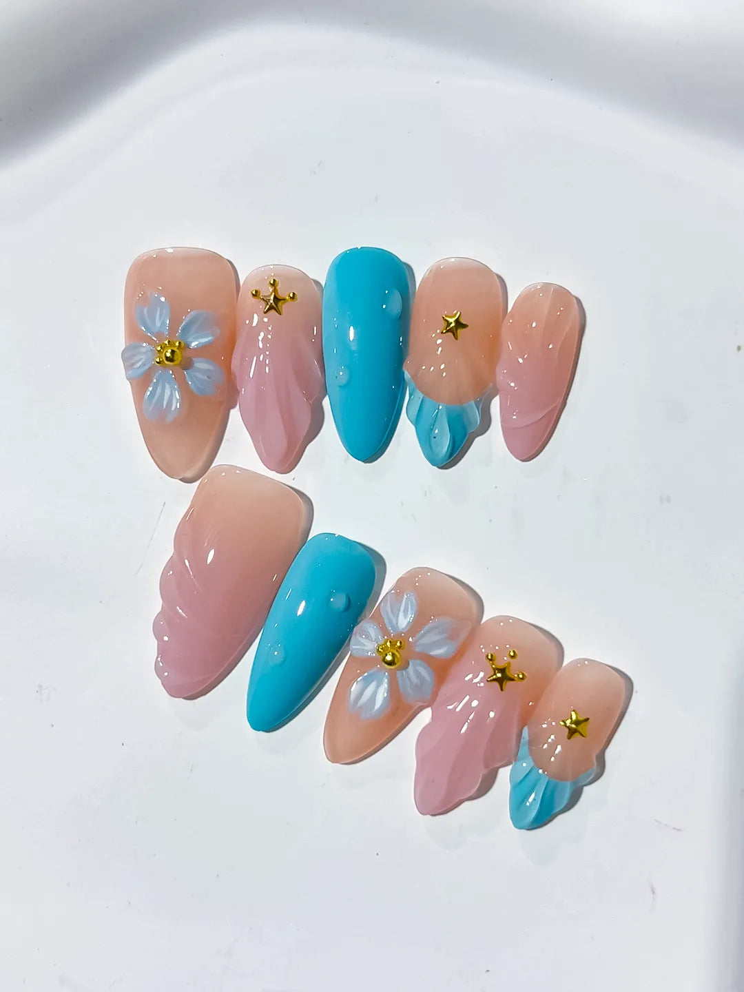 Nude Pink Blue Abstract Flower Star press on nails close up