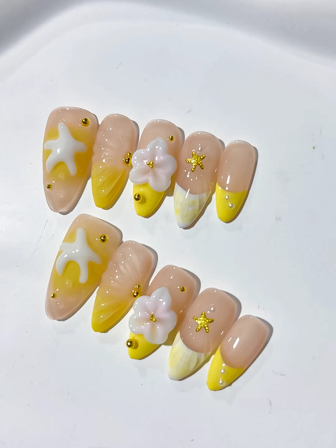 Nude Yellow White French tip Flower Starfish press on nails detail view