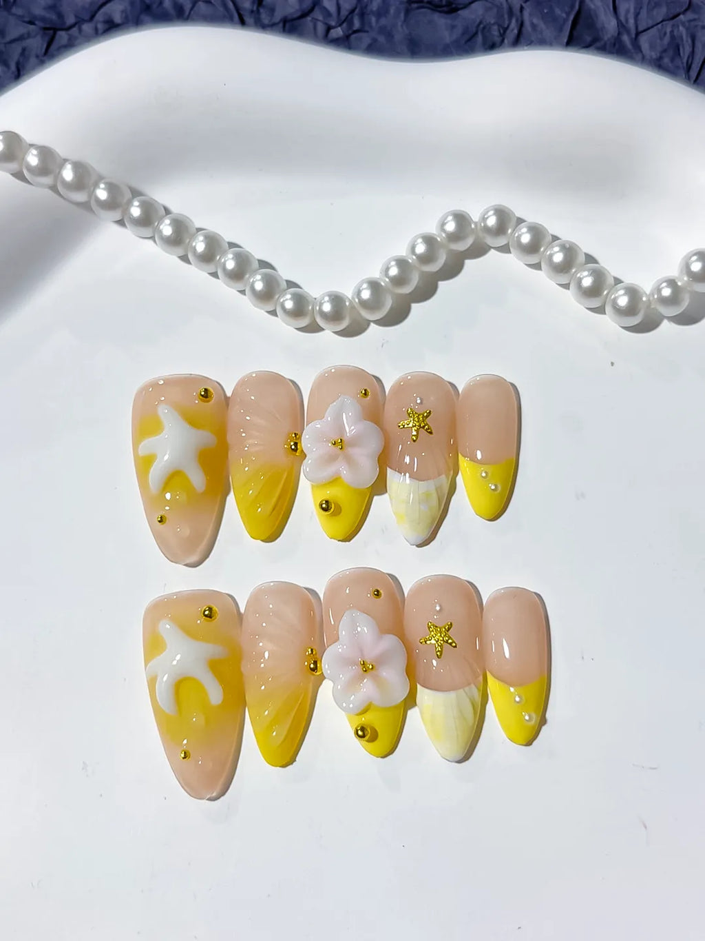 Nude Yellow White French tip Flower Starfish press on nails detail view