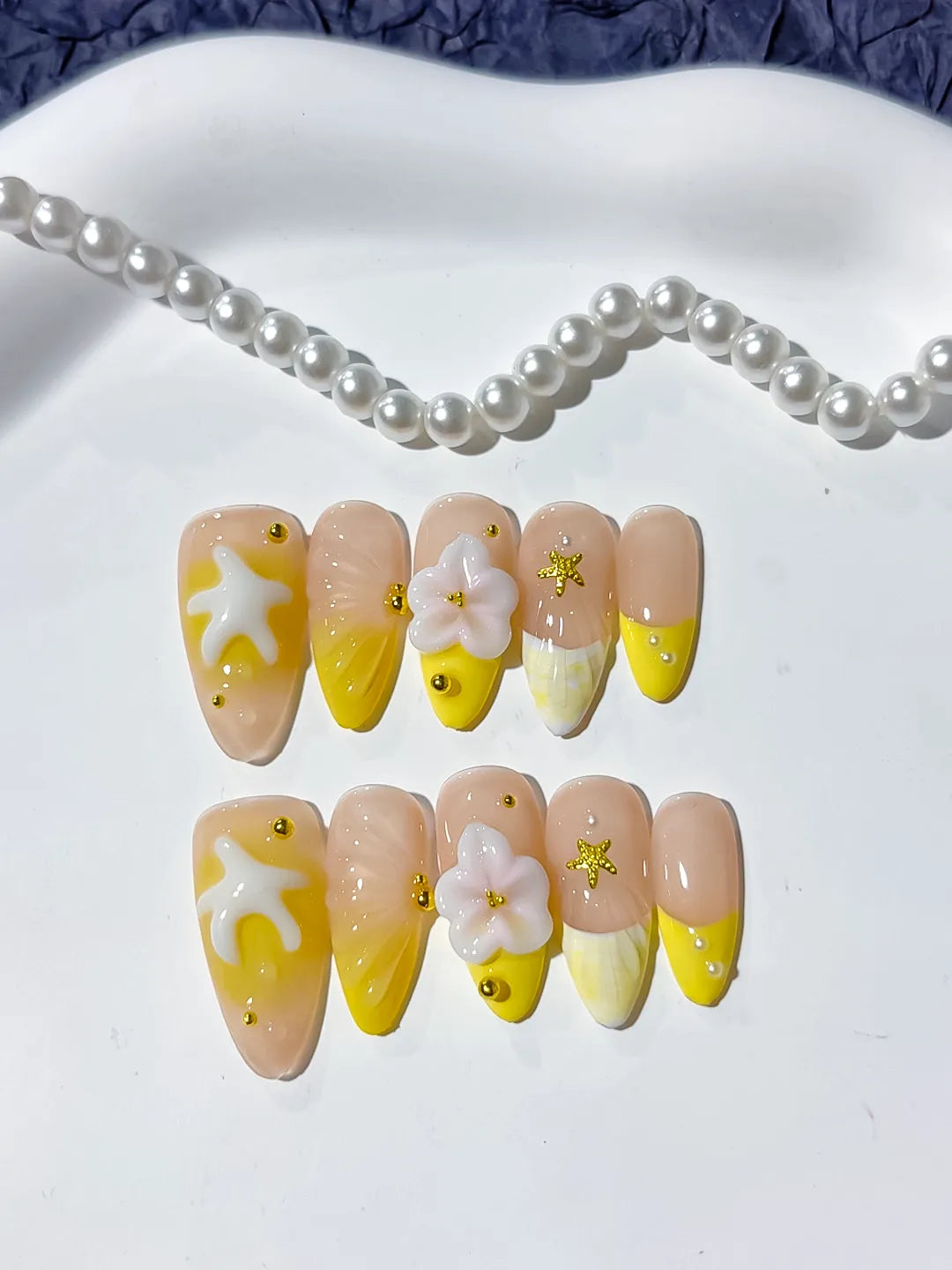 Nude Yellow White French tip Flower Starfish press on nails detail view