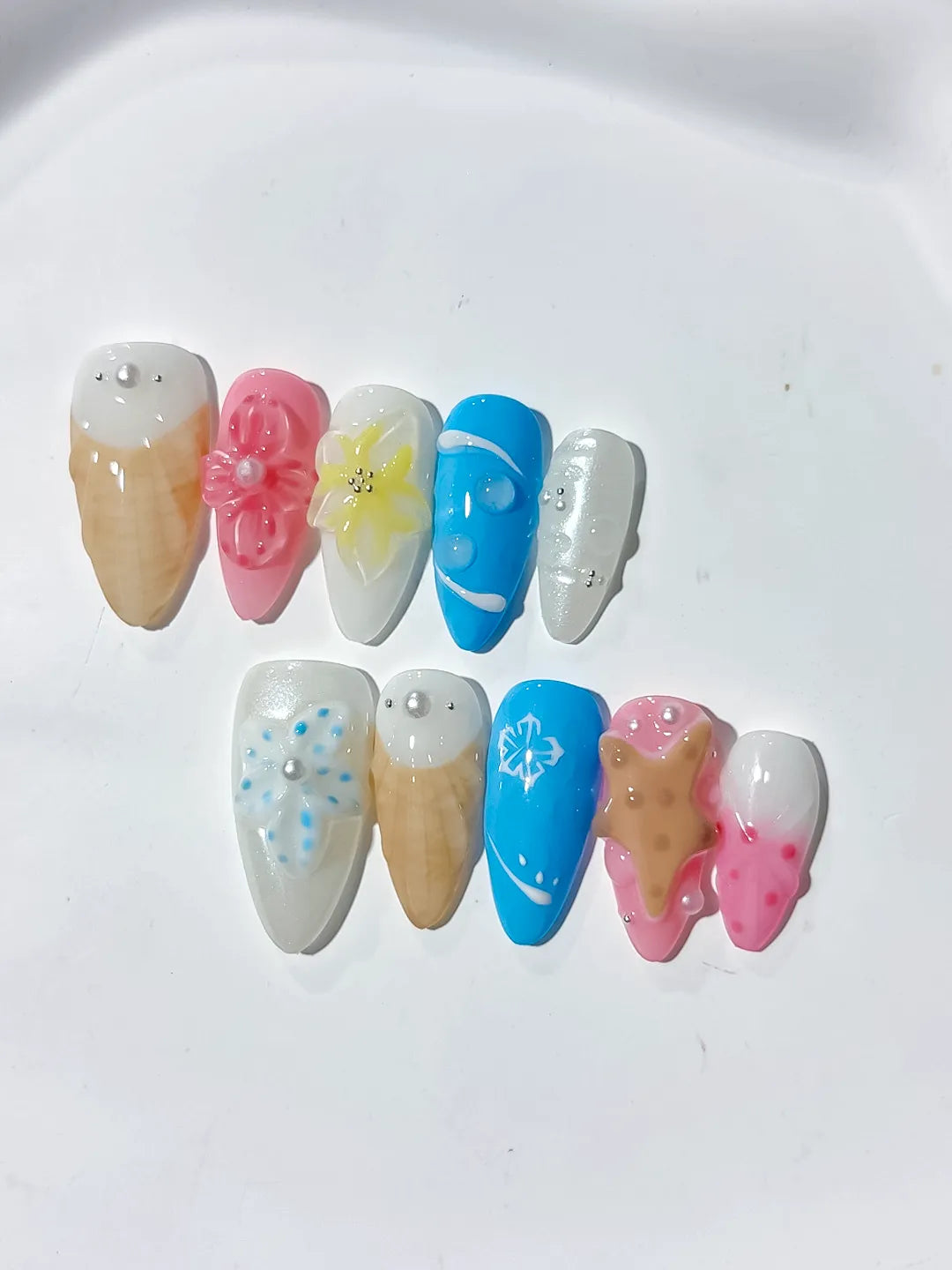 Nude Pink Blue Abstract Flower Cookie Snowflake press on nails detail view