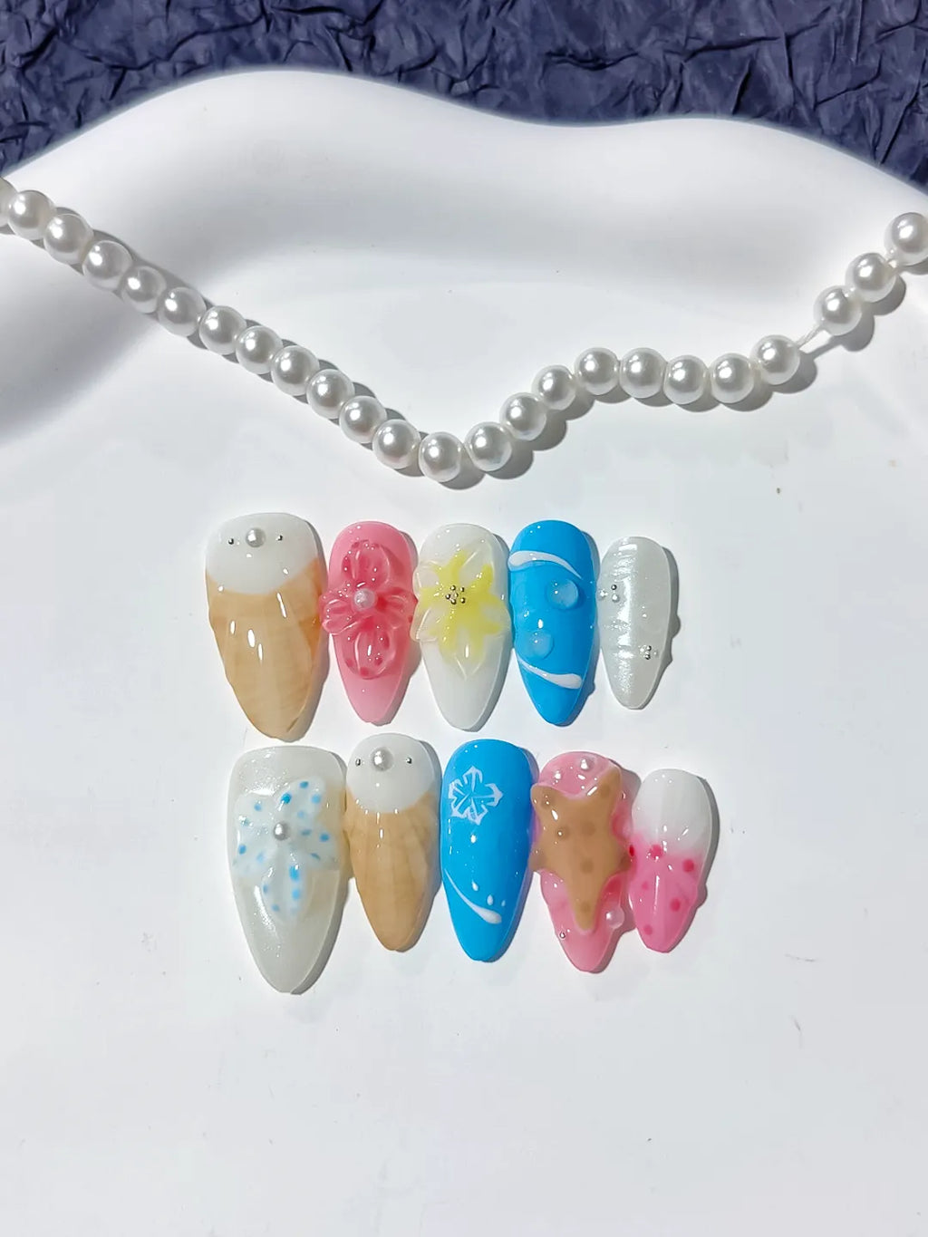 Nude Pink Blue Abstract Flower Cookie Snowflake press on nails detail view