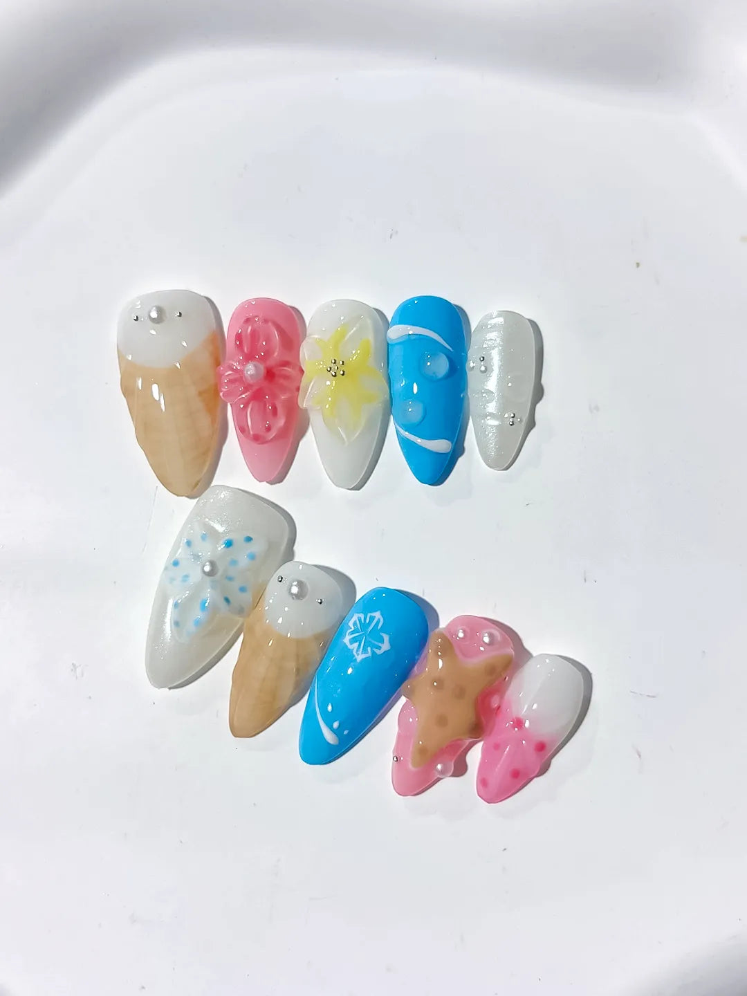 Nude Pink Blue Abstract Flower Cookie Snowflake press on nails close up