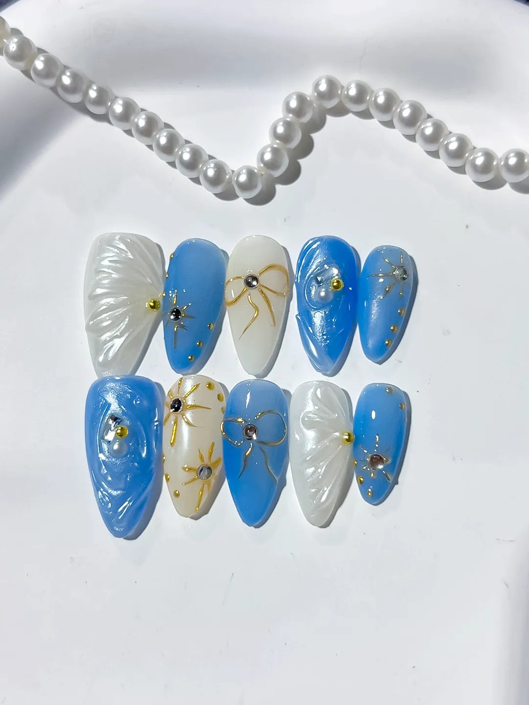 Blue White Holographic Shell Bow Star press on nails detail view