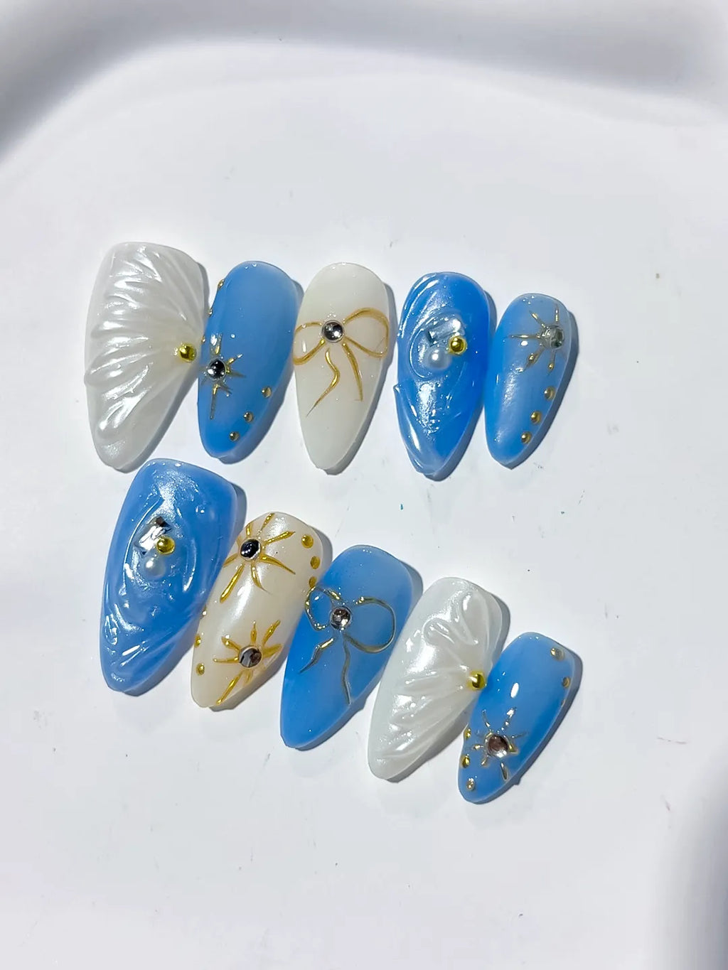 Blue White Holographic Shell Bow Star press on nails close up
