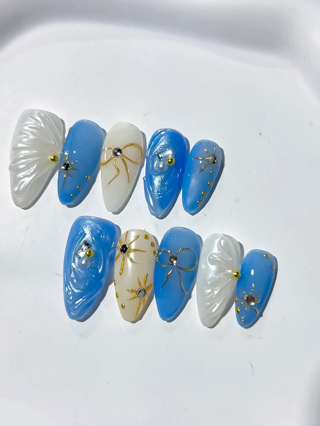 Blue White Holographic Shell Bow Star press on nails detail view