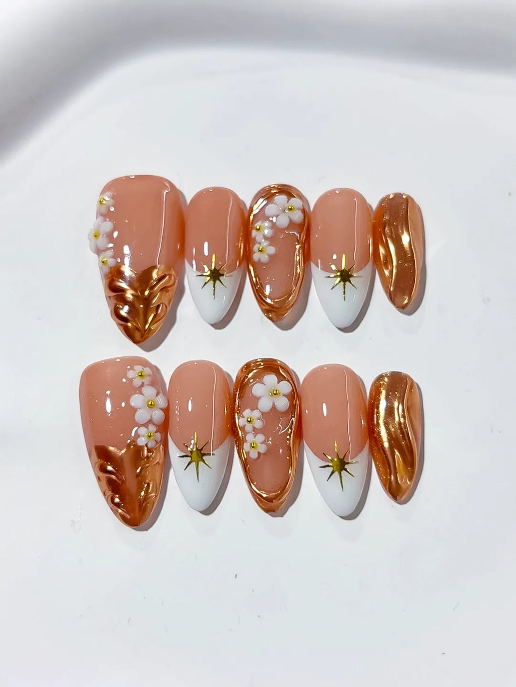 Nude Brown White Metallic Flower Star press on nails close up
