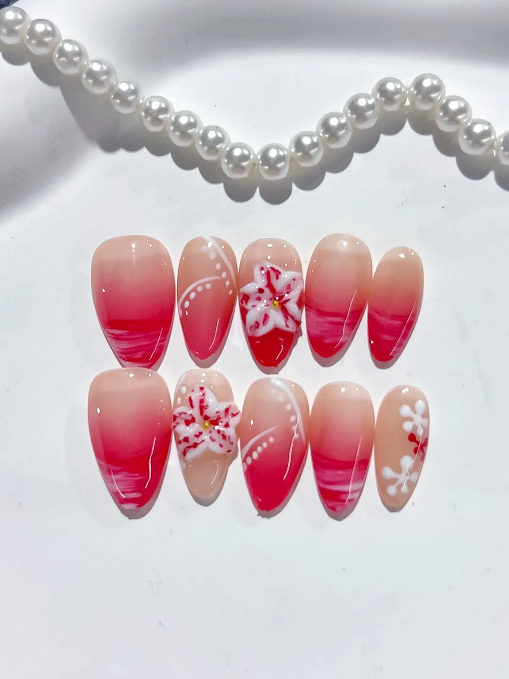 Nude Pink Red French tip Flower press on nails detail view
