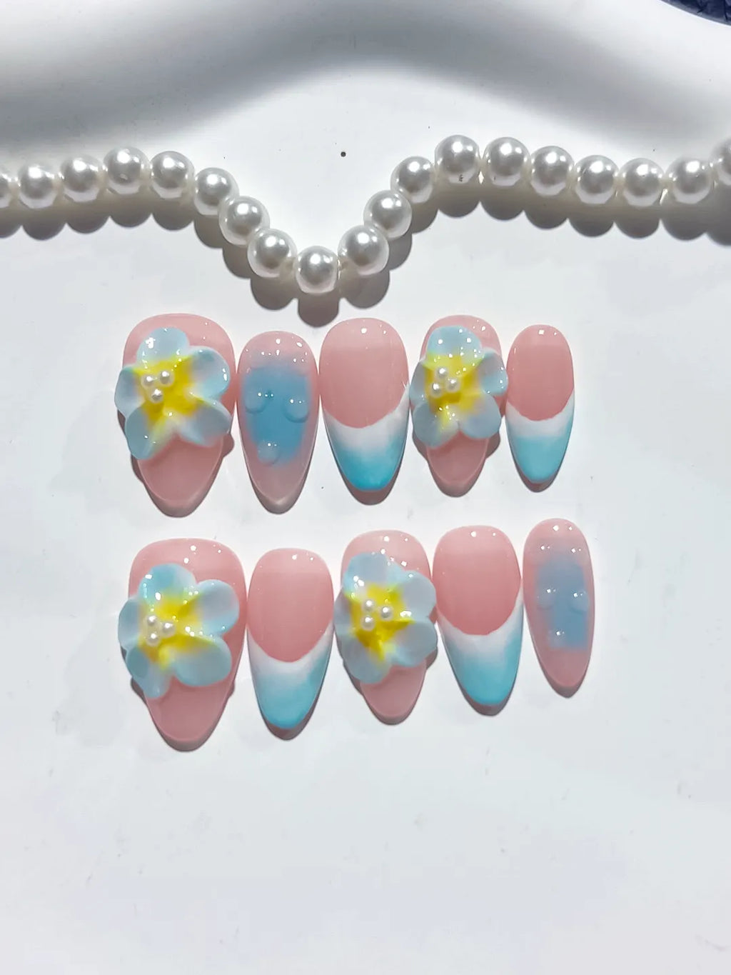 Pink Blue Yellow Ombre Flower press on nails close up